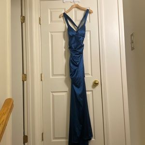 Dark teal full-length dress with crossback and tie. Worn once in great condition